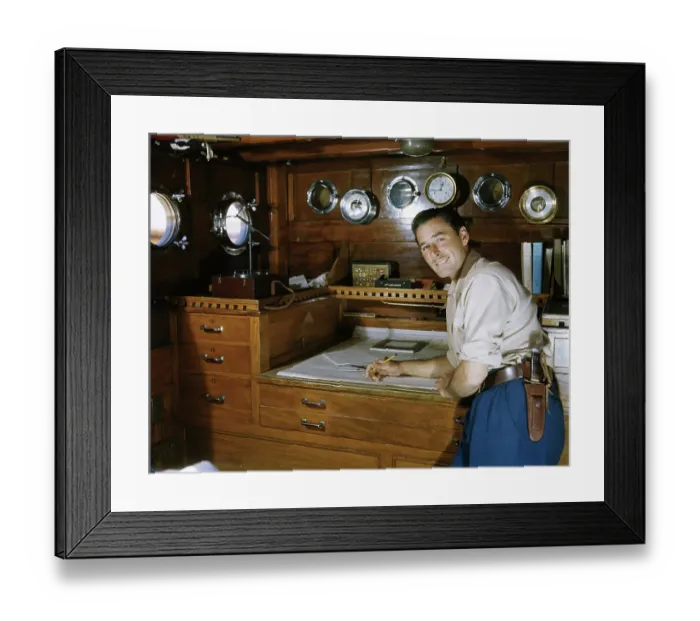 Framed Print : Errol Flynn in Yacht's Cabin Framed Print : Errol Flynn in Yacht's Cabin