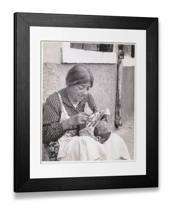 Framed Print : Woman Embroidering Cloth Framed Print : Woman Embroidering Cloth