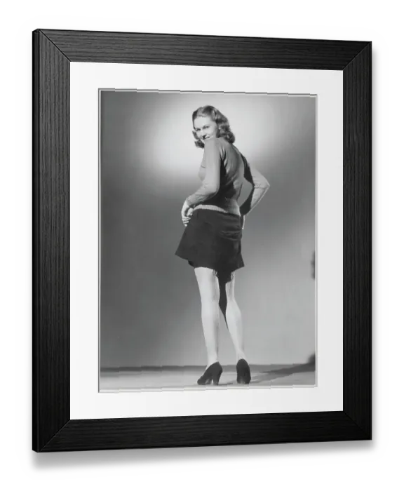 Framed Print : Woman Revealing Seamed Nylon Stockings Framed Print : Woman Revealing Seamed Nylon Stockings
