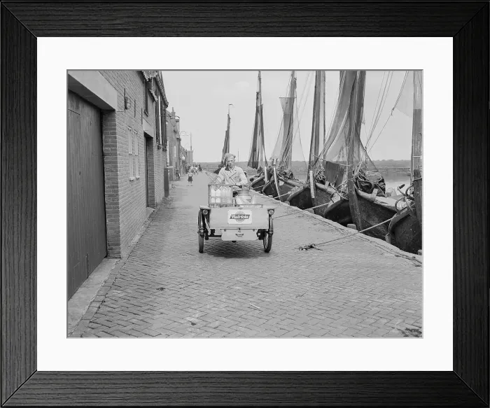 Framed Print : Milk Man on Motor Vehicle at Harbor Framed Print : Milk Man on Motor Vehicle at Harbor