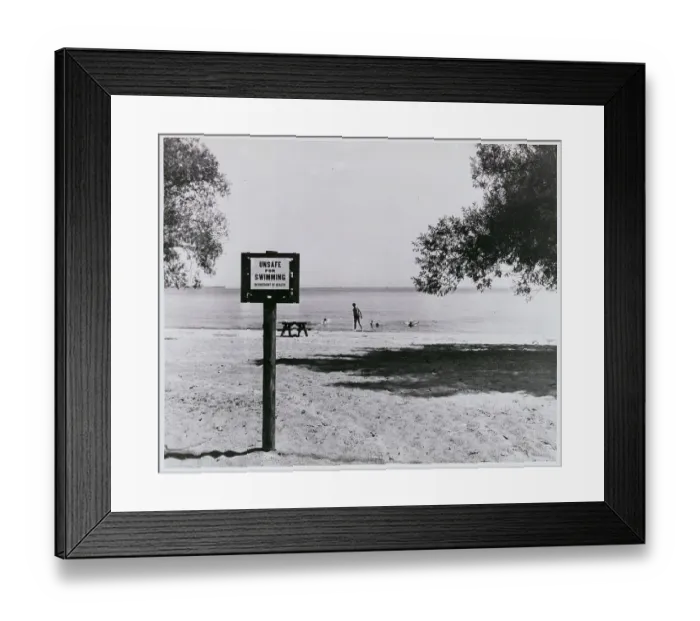 Framed Print : Posted Warning Sign at Sparsely Populated Beach Area Framed Print : Posted Warning Sign at Sparsely Populated Beach Area