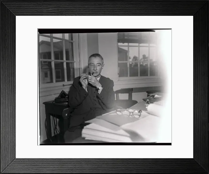 Framed Print : Robert Oppenheimer Lighting a Pipe Framed Print : Robert Oppenheimer Lighting a Pipe