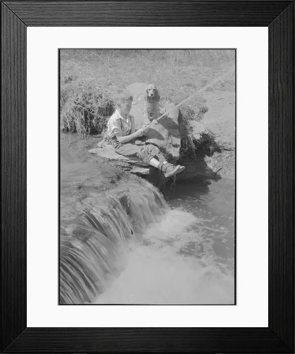 Framed Print : Boy Fishing with Dog