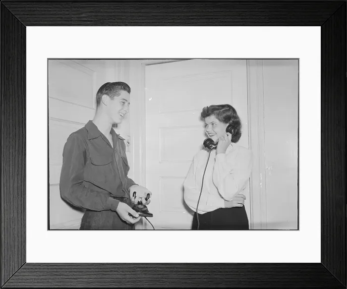 Framed Print : Robert Sulat and Mary Ellen Setting Up a Double Date