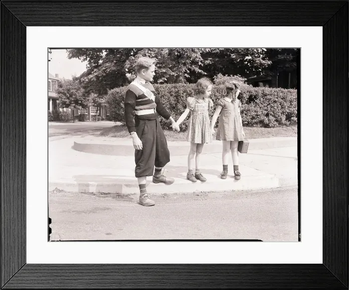 Framed Print : Boy Helping Girls Cross the Street Framed Print : Boy Helping Girls Cross the Street