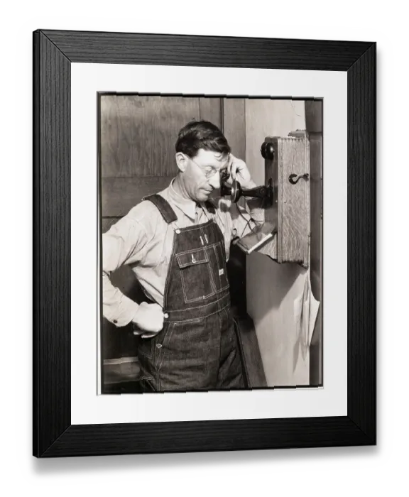 Framed Print : Farmer Using Telephone