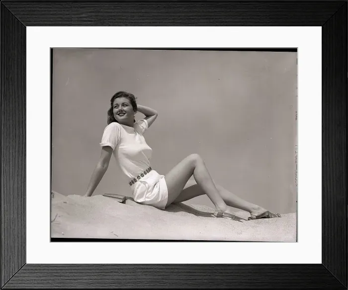 Framed Print : Woman in White Shirt and Shorts Framed Print : Woman in White Shirt and Shorts