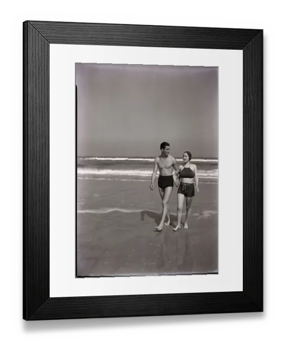 Framed Print : Couple Walking on the Beach Framed Print : Couple Walking on the Beach