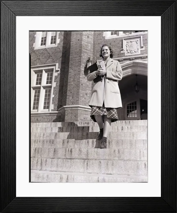Framed Print : Young Woman Walking Down Steps Framed Print : Young Woman Walking Down Steps