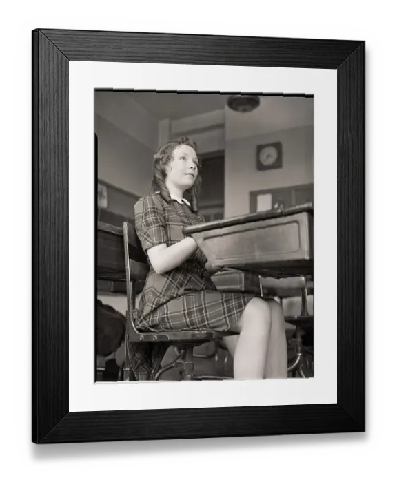 Framed Print : Girl Seated at School Desk Framed Print : Girl Seated at School Desk