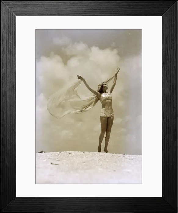 Framed Print : Woman in Swimsuit with Arms Outstretched Framed Print : Woman in Swimsuit with Arms Outstretched