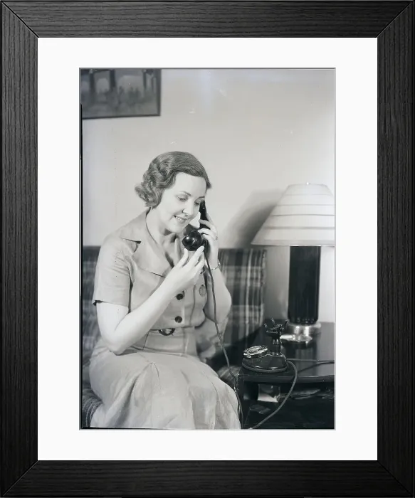Framed Print : Woman Using Telephone Framed Print : Woman Using Telephone