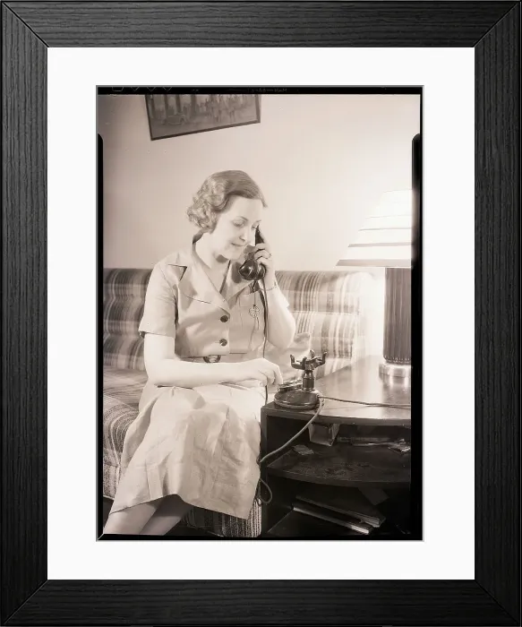 Framed Print : Woman Using Telephone Framed Print : Woman Using Telephone