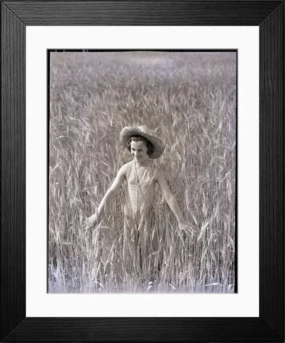 Framed Print : Girl Standing in Wheat Field Framed Print : Girl Standing in Wheat Field