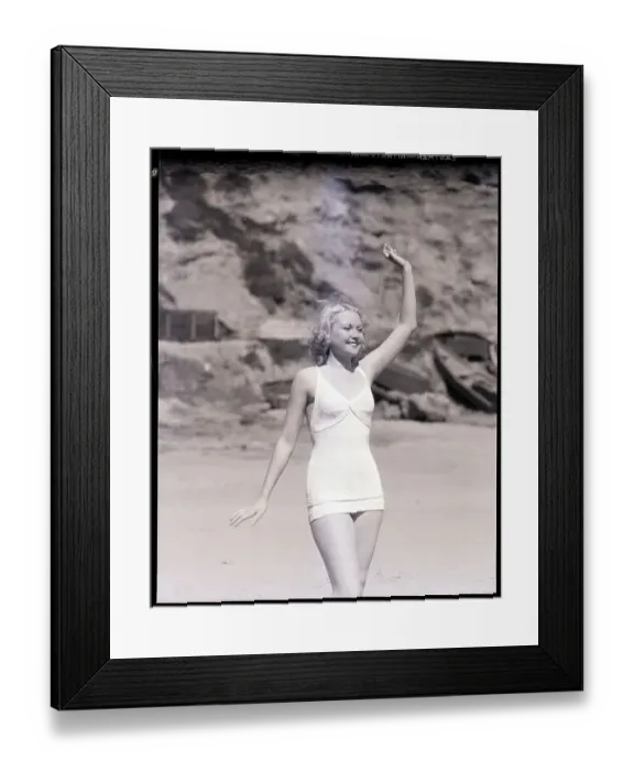 Framed Print : Young Woman Posing on the Beach Framed Print : Young Woman Posing on the Beach