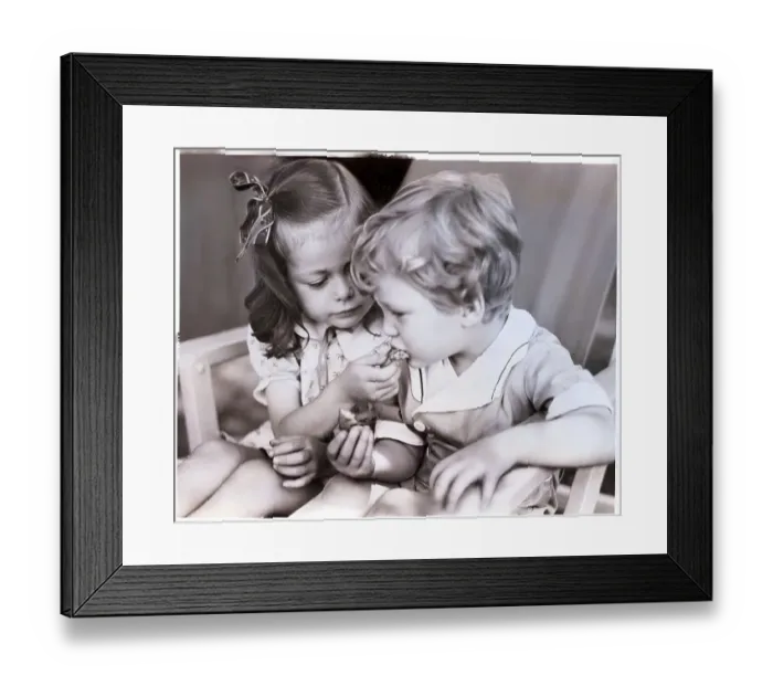 Framed Print : Girl Feeding Boy Framed Print : Girl Feeding Boy