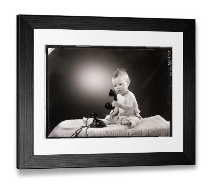 Framed Print : Baby Playing with Telephone Framed Print : Baby Playing with Telephone