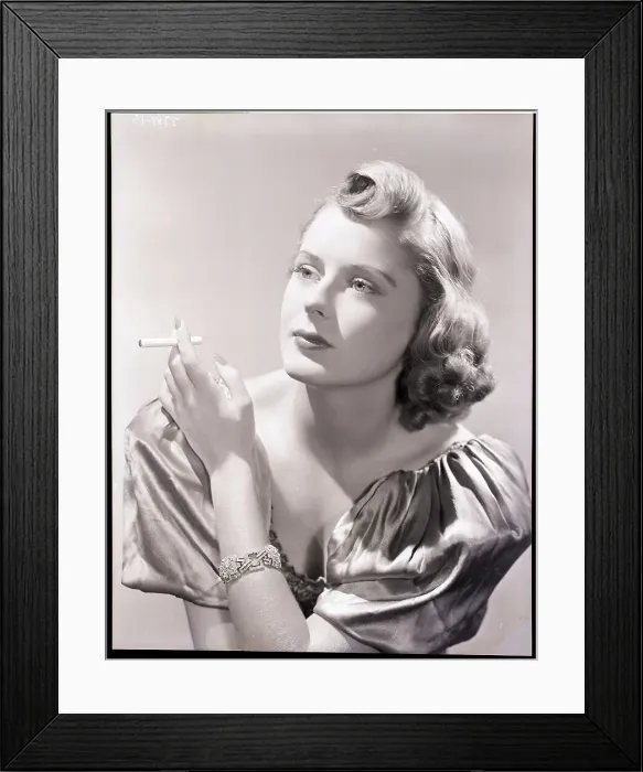 Framed Print : Woman Smokes While Modeling Negligee Framed Print : Woman Smokes While Modeling Negligee