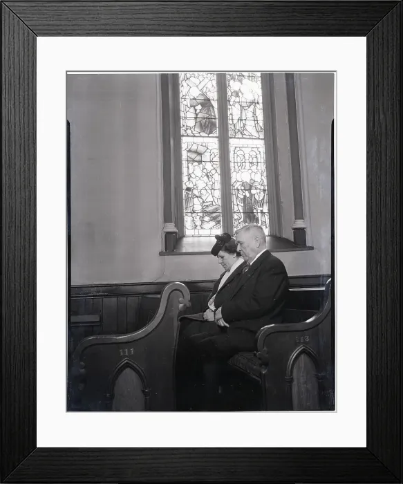 Framed Print : Couple Seated in Church Pew