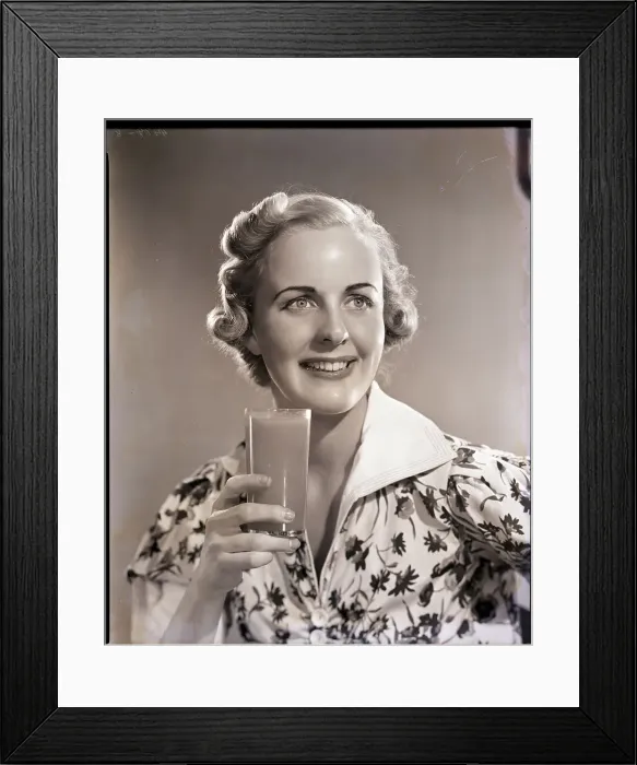 Framed Print : Woman Holding Beverage Glass Framed Print : Woman Holding Beverage Glass