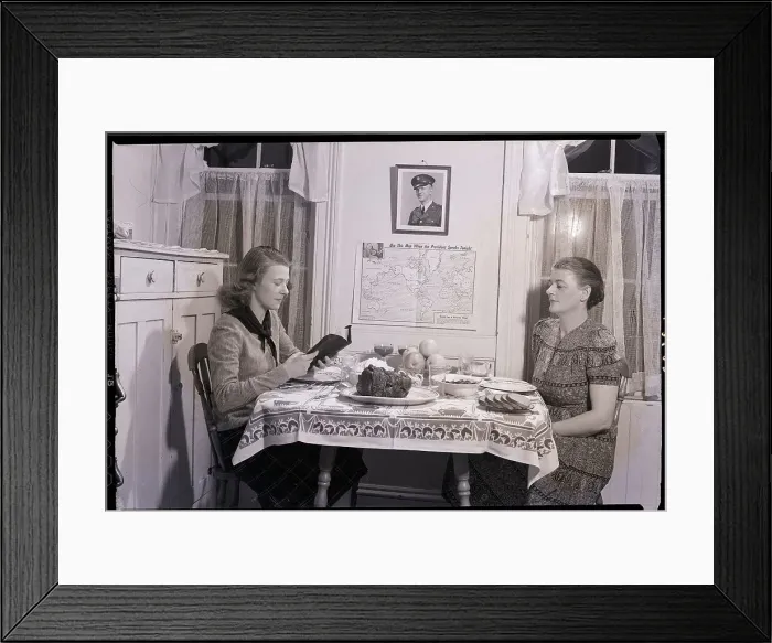 Framed Print : Mother And Daughter Having Dinner Framed Print : Mother And Daughter Having Dinner