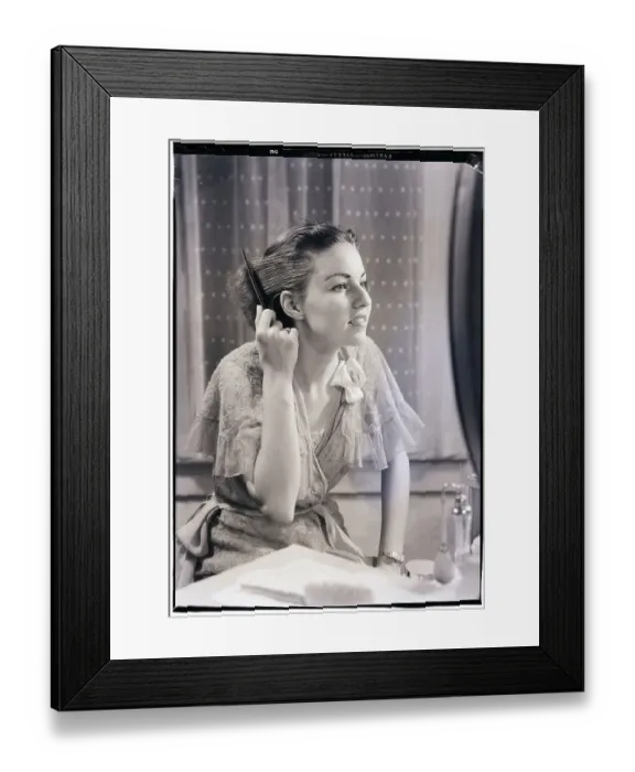Framed Print : Woman Combing Her Hair Framed Print : Woman Combing Her Hair