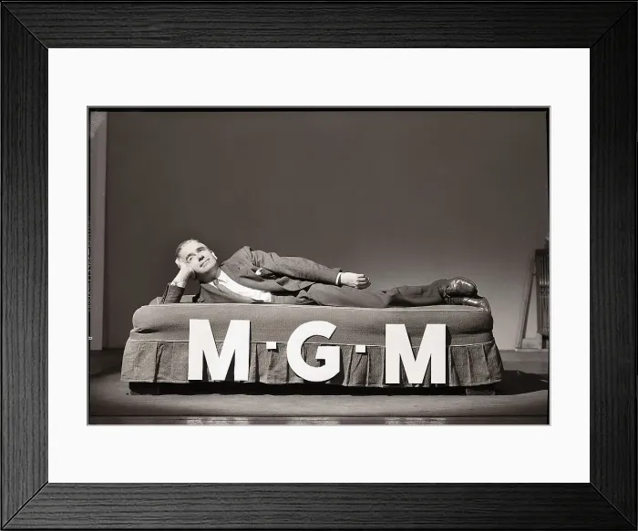 Framed Print : Man Lying on M-G-M Bed Framed Print : Man Lying on M-G-M Bed