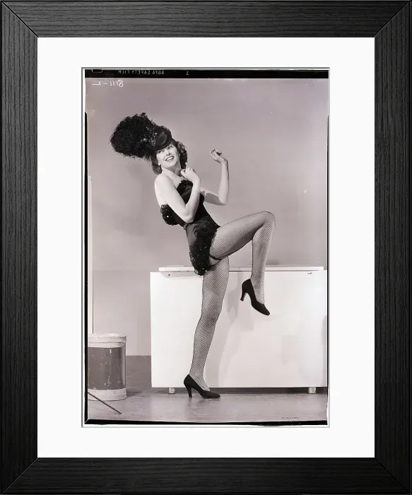Framed Print : Showgirl. (Original Caption). Photo shows a woman dressed as a showgirl Framed Print : Showgirl. (Original Caption). Photo shows a woman dressed as a showgirl