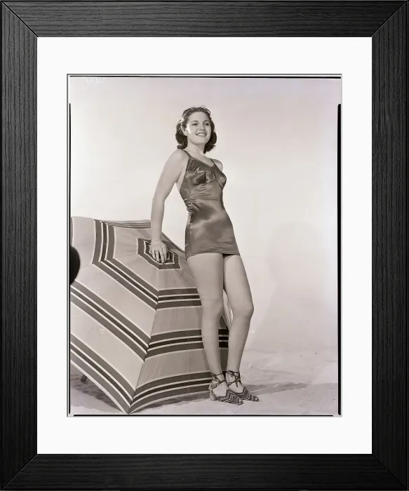Framed Print : Woman Modeling Swimsuit By Umbrella Framed Print : Woman Modeling Swimsuit By Umbrella