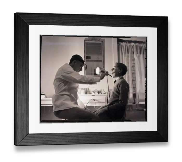 Framed Print : Doctor Examining Boy Patient Framed Print : Doctor Examining Boy Patient