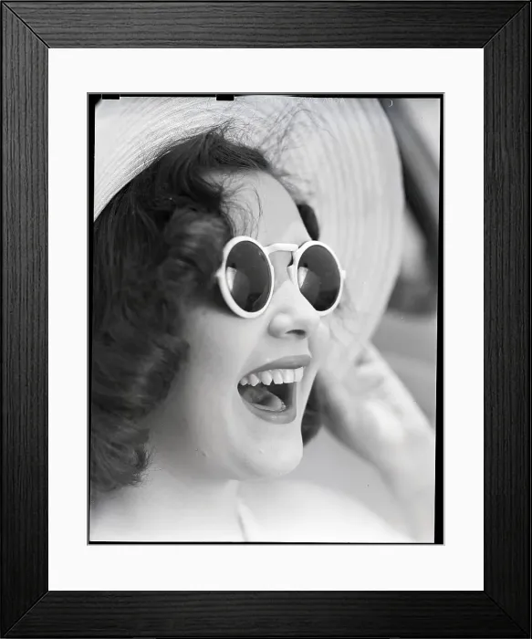 Framed Print : Closeup of Woman Wearing Sunglasses Framed Print : Closeup of Woman Wearing Sunglasses