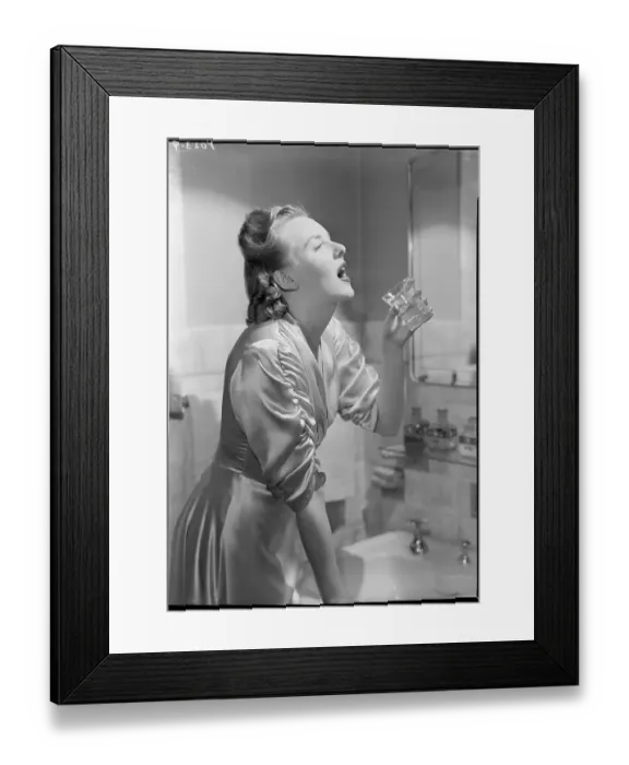 Framed Print : Woman Gargles Wearing Satin Robe Framed Print : Woman Gargles Wearing Satin Robe