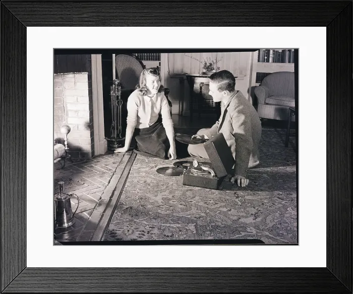 Framed Print : Boy and Girl Sitting by Fireplace with Phonograph Framed Print : Boy and Girl Sitting by Fireplace with Phonograph