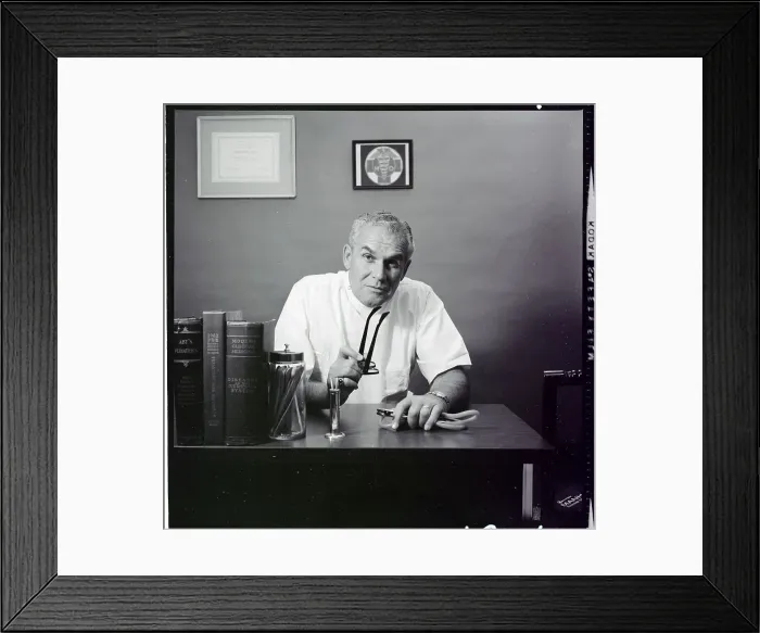 Framed Print : Doctor Sitting at Desk