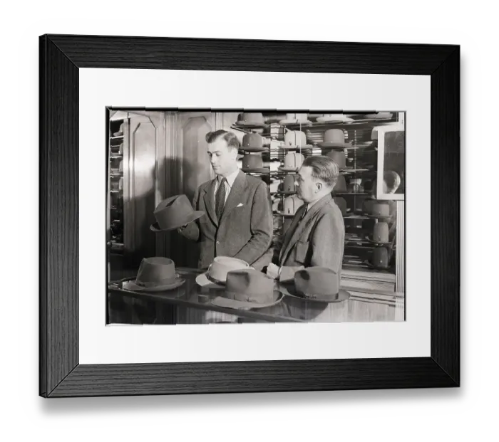 Framed Print : Man Shopping for Hat Framed Print : Man Shopping for Hat