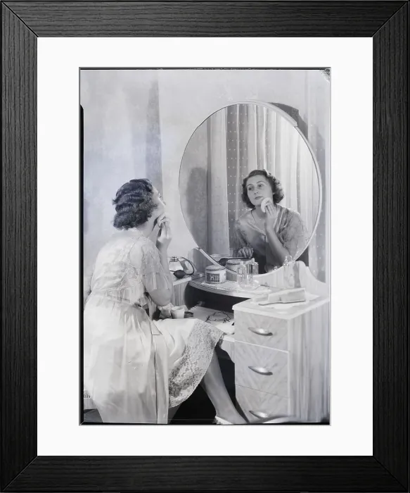 Framed Print : Woman Applying Powder at Vanity Framed Print : Woman Applying Powder at Vanity