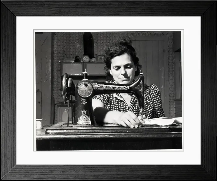 Framed Print : Farmwife In Maine Sews Clothes
