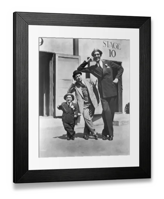 Framed Print : Giant, Dwarf, and Average Man Framed Print : Giant, Dwarf, and Average Man