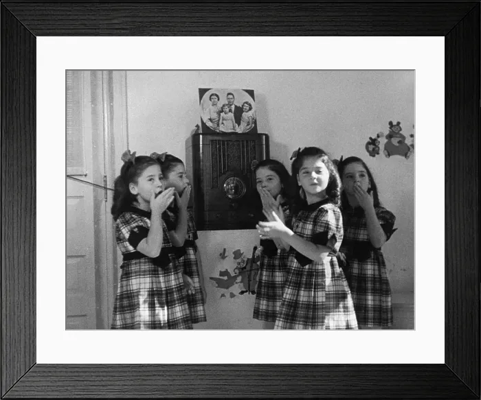 Framed Print : Young Dionne Quintuplets near Radio Framed Print : Young Dionne Quintuplets near Radio