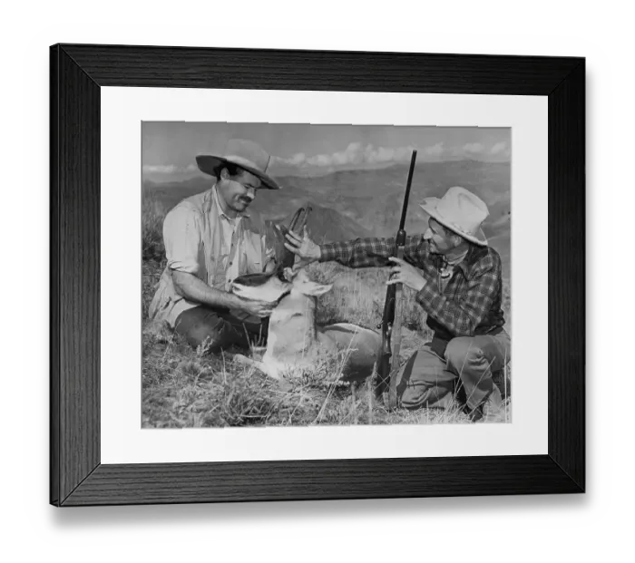Framed Print : Ernest Hemingway and Taylor Williams Inspecting an Antelope Framed Print : Ernest Hemingway and Taylor Williams Inspecting an Antelope