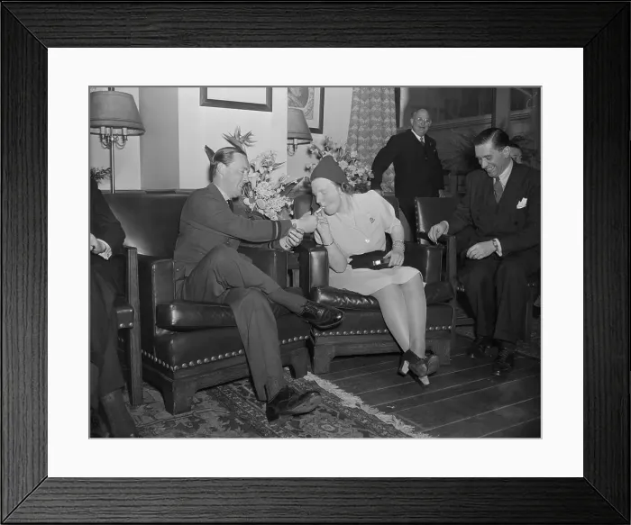 Framed Print : Prince Bernhard Lighting Cigarette for Princess Juliana Framed Print : Prince Bernhard Lighting Cigarette for Princess Juliana