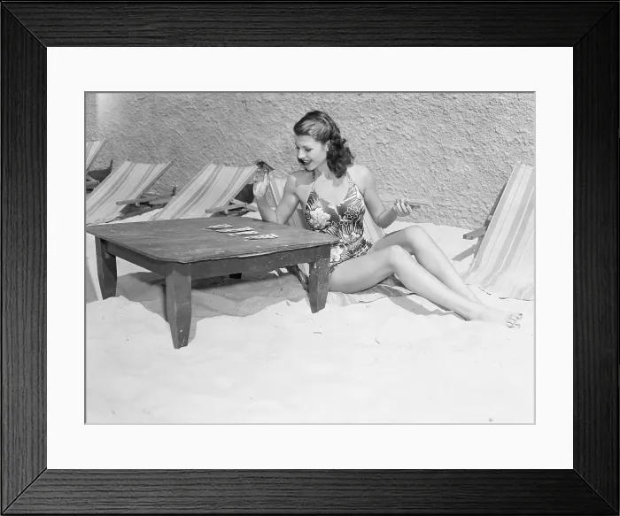 Framed Print : Rita Hayworth Playing Cards at a Beach Framed Print : Rita Hayworth Playing Cards at a Beach