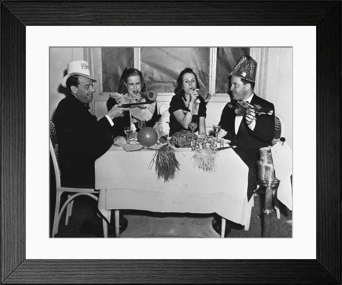 Framed Print : People with Party Favors at New Years Party Framed Print : People with Party Favors at New Years Party
