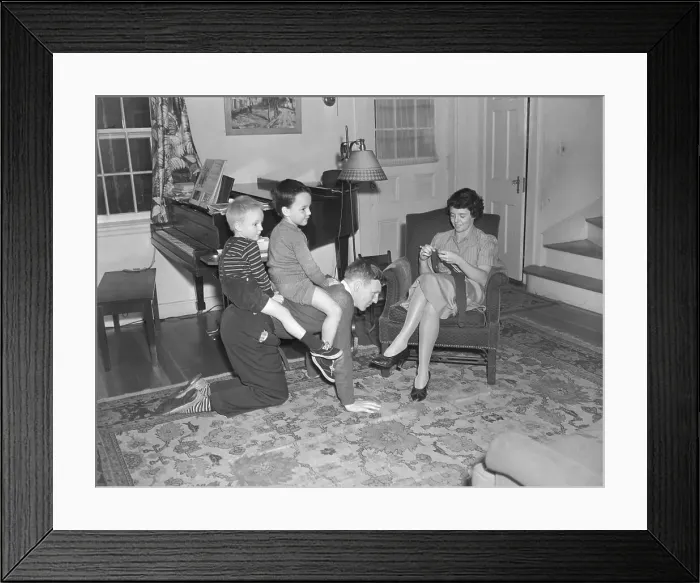 Framed Print : Boys Riding Piggyback Around Living Room