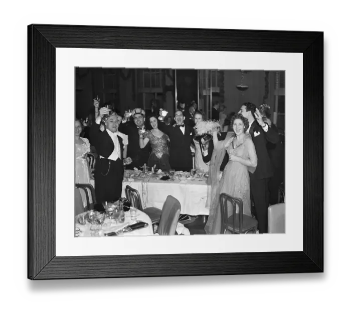 Framed Print : Crowd Toasting at New Years Celebration
