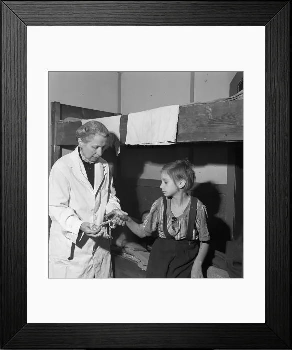 Framed Print : Doctor Examining Child in Postwar Camp