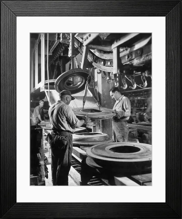 Framed Print : Workers at a Tire Manufacturing Plant Framed Print : Workers at a Tire Manufacturing Plant