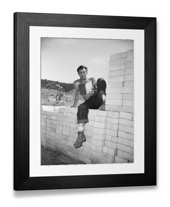Framed Print : Robert Mitchum Sitting On Wall W / Script Framed Print : Robert Mitchum Sitting On Wall W / Script