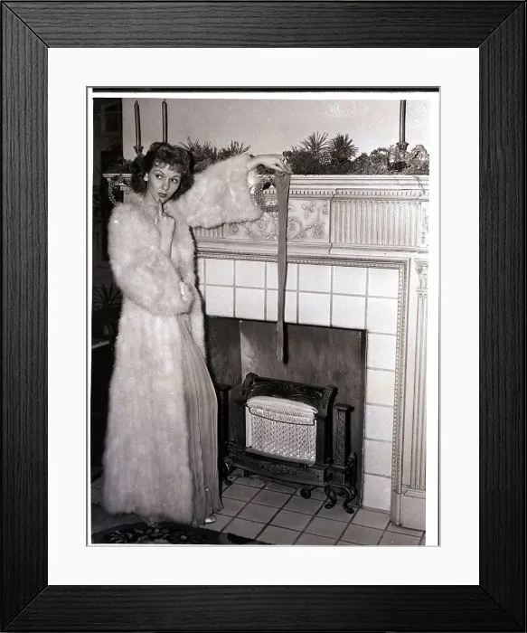 Framed Print : Mary Martin Holding Up Stocking Framed Print : Mary Martin Holding Up Stocking