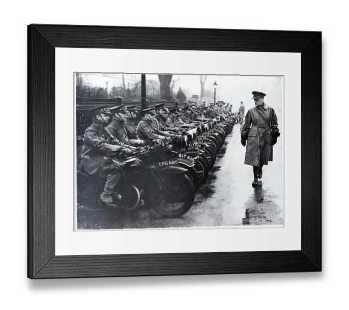 Framed Print : Man Inspecting Motorcycles Framed Print : Man Inspecting Motorcycles